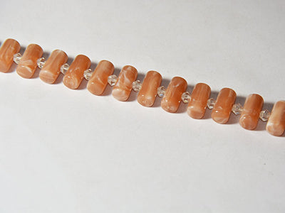 beige-cylindrical-resin-beads