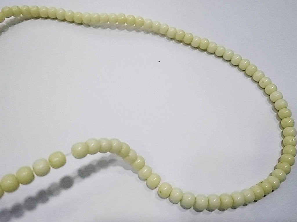 beige-opaque-spherical-pressed-glass-beads-4-mm
