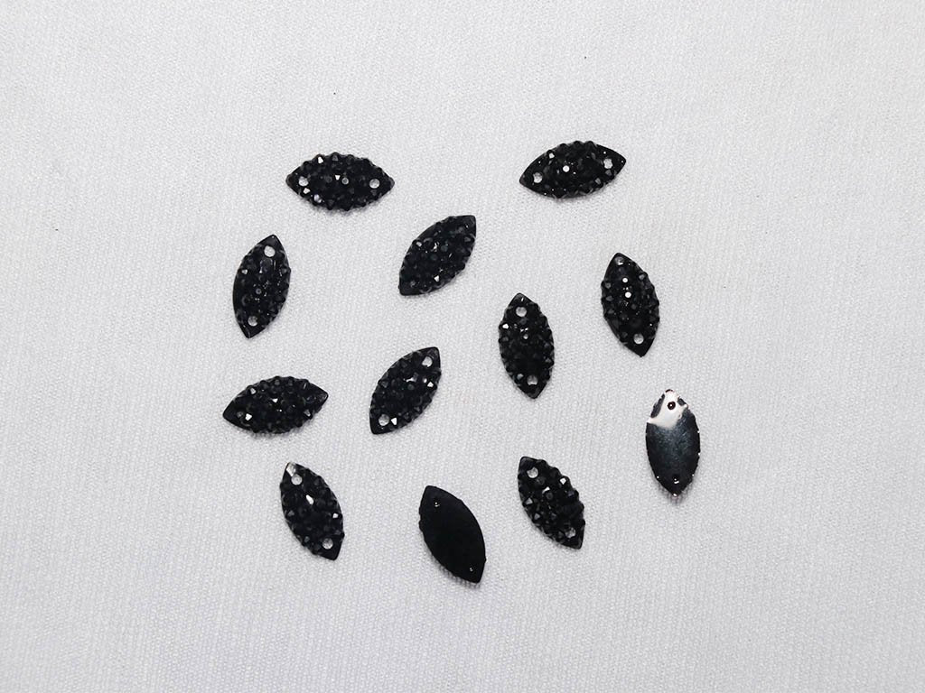 black-designer-eye-plastic-stones-6x12-mm