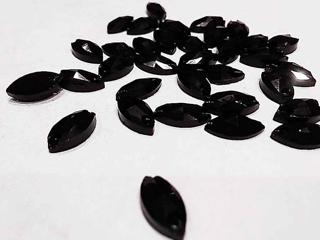 black-eye-2-hole-plastic-stones-15x7-mm