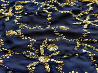 black-heavy-embellished-golden-sequinned-georgette-fabric