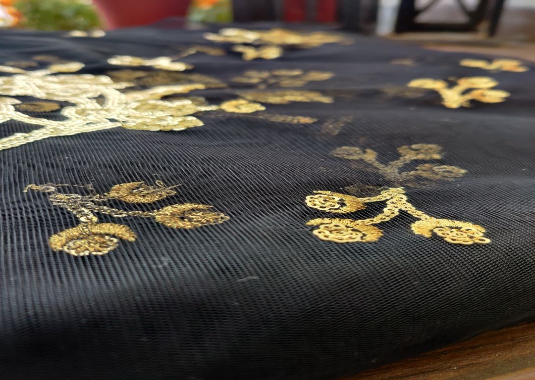 black-net-with-golden-sequin-motifs-all-over