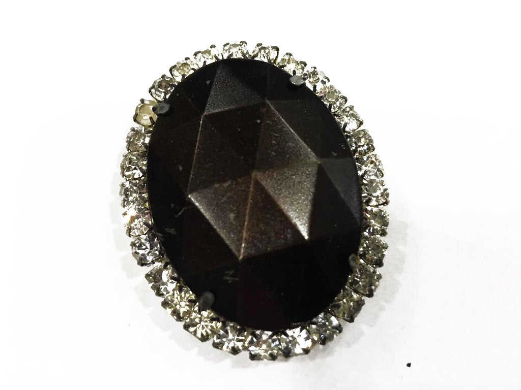 black-oval-plastic-stone-with-crystal-frame-25x18-mm