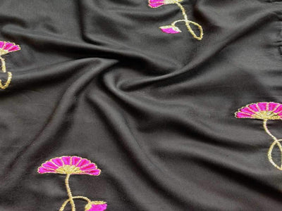 black-rayon-fabric-with-embroidered-pink-flowers-all-over