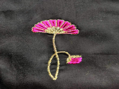 black-rayon-fabric-with-embroidered-pink-flowers-all-over