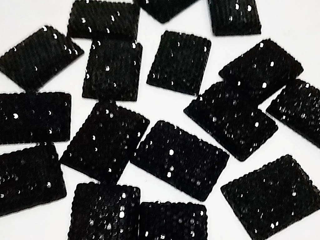 black-rectangular-sugar-2-hole-plastic-stones-25x18-mm