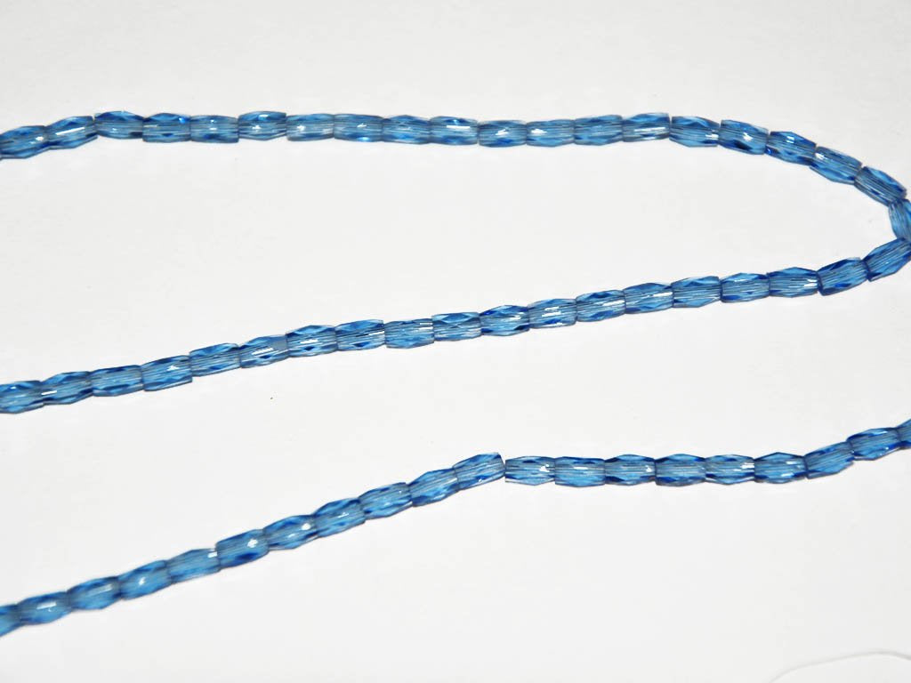 blue-faceted-tube-crystal-beads