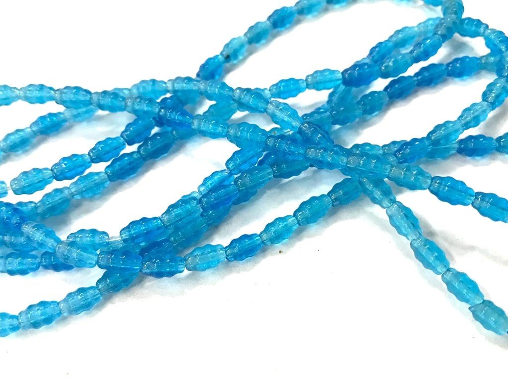 blue-fancy-oval-pressed-glass-beads