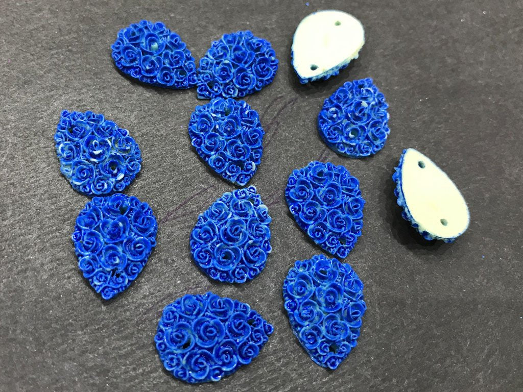 blue-matte-flower-drop-resin-stone-2-hole-18x13-mm