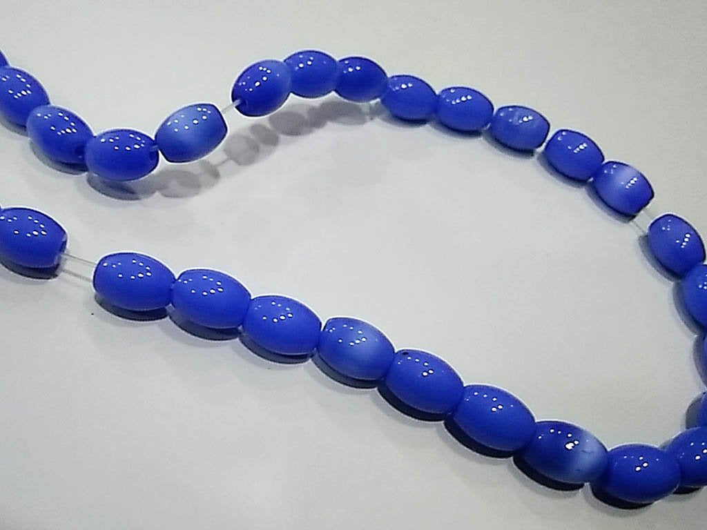 blue-opaque-oval-pressed-glass-beads-7x10-mm
