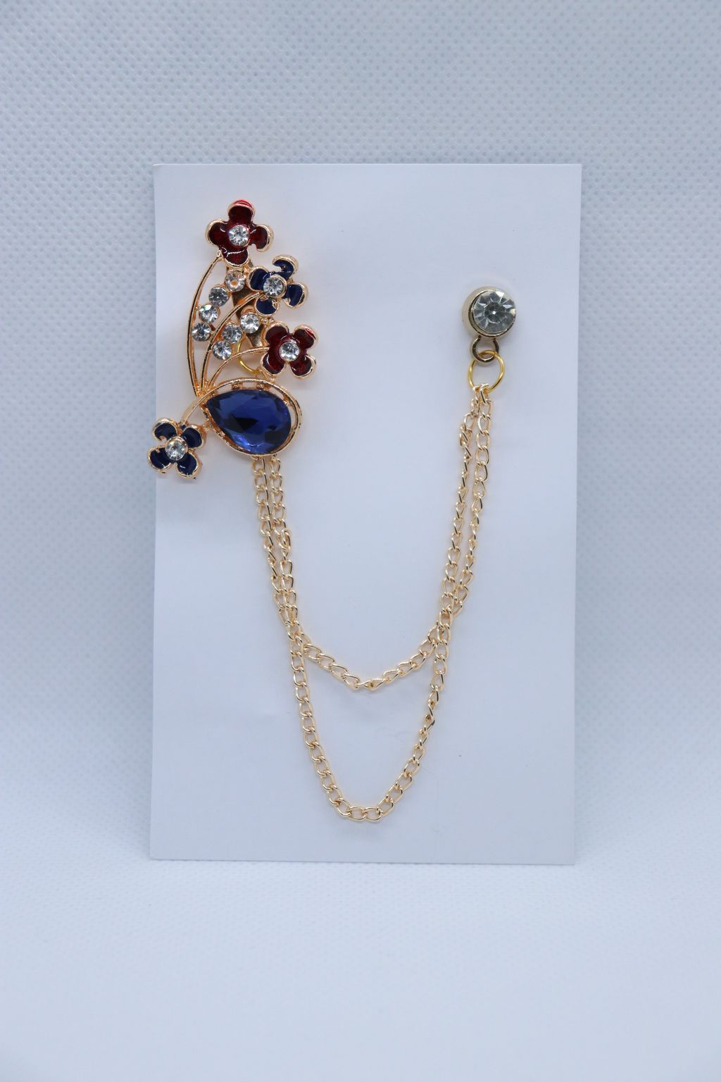 blue-stone-with-red-flower-brooch