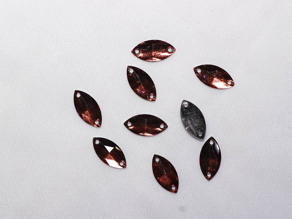 brown-2-hole-eye-plastic-stones-9x18-mm