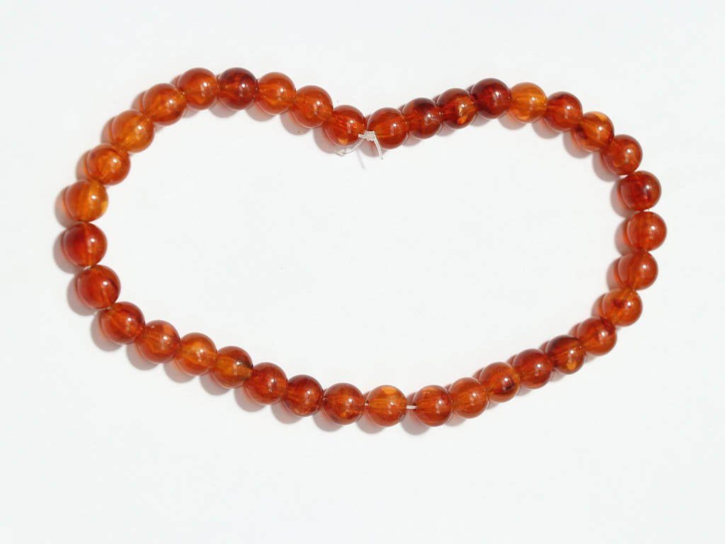 brown-circular-plastic-beads-10-mm-1