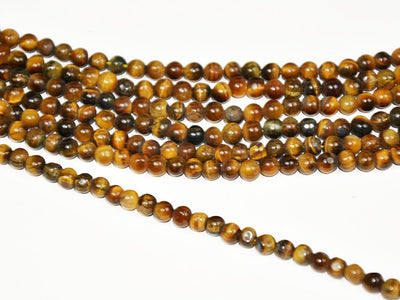 brown-designer-tiger-eye-spherical-glass-beads