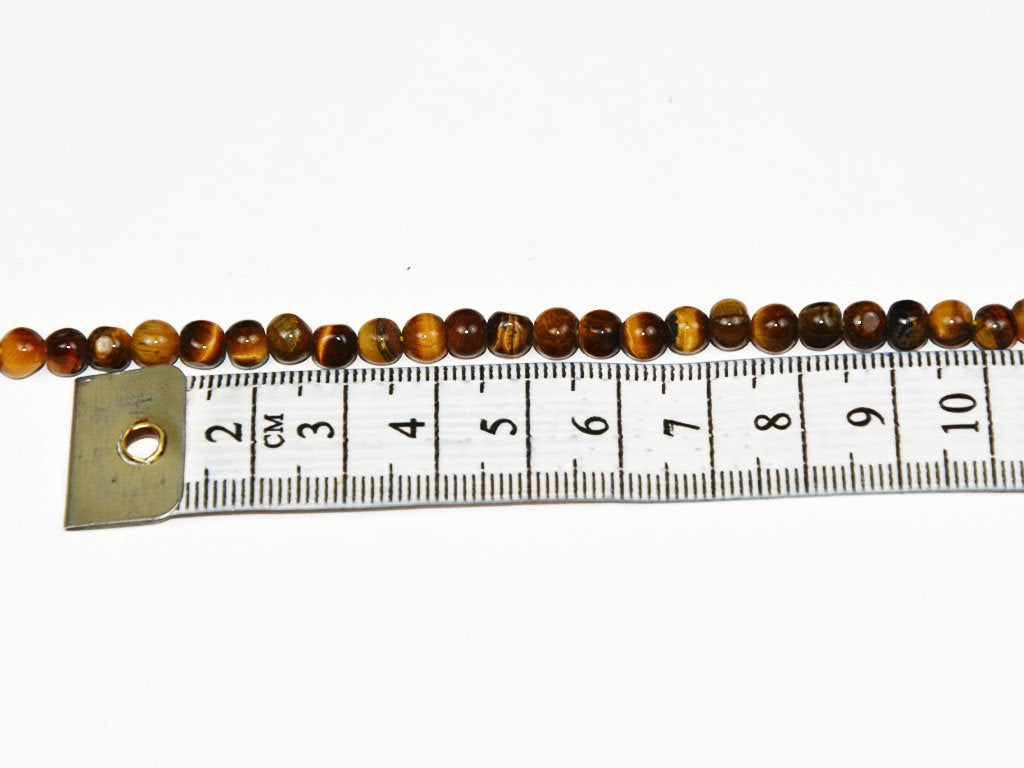 brown-designer-tiger-eye-spherical-glass-beads