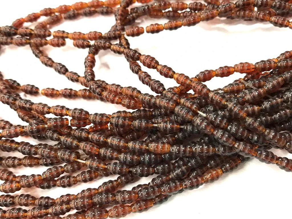 brown-fancy-oval-pressed-glass-beads