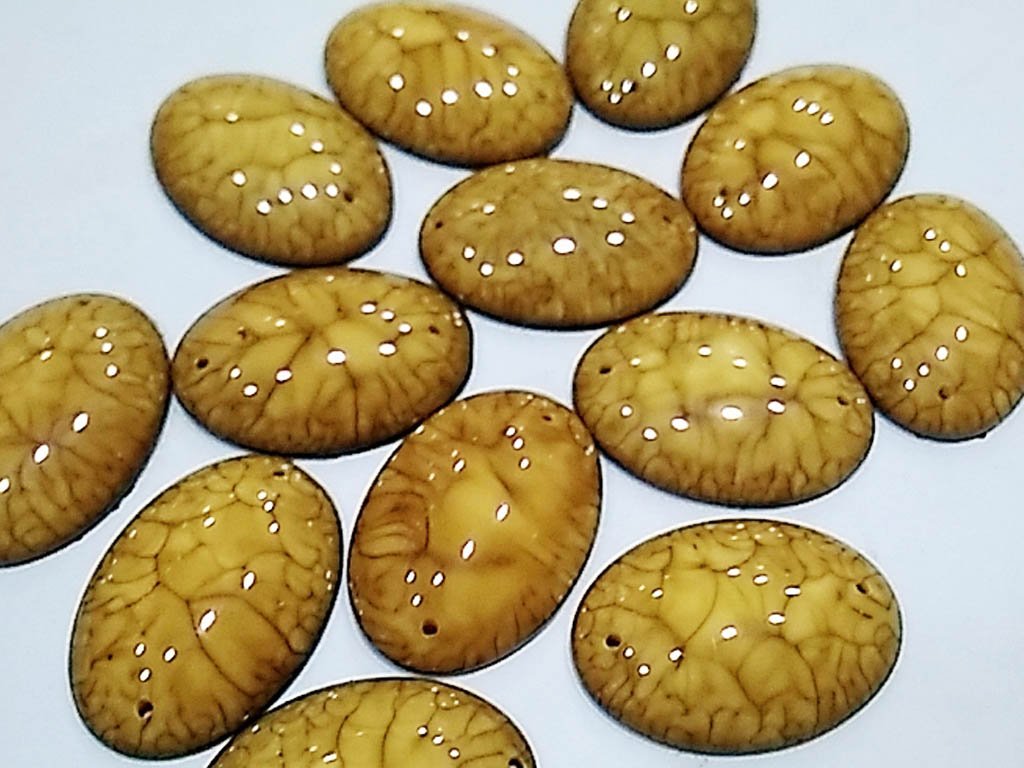 brown-textured-oval-2-hole-plastic-stones-25x18-mm