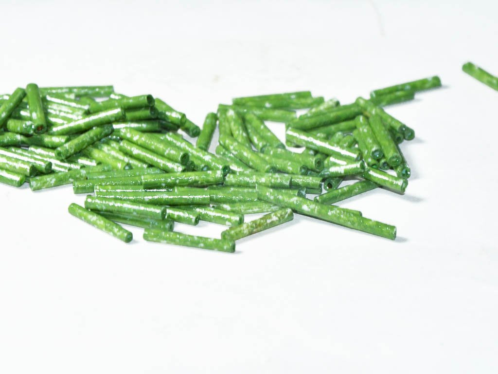 light-green-opaque-pipe-bugle-glass-seed-beads-9-mm