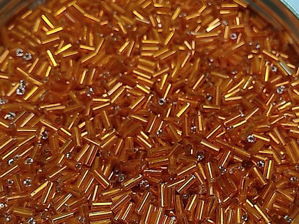 orange-transparent-silverline-pipe-bugle-glass-seed-beads