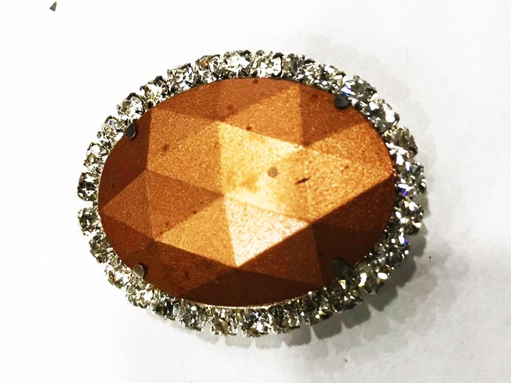 copper-oval-plastic-stone-with-crystal-frame-25x18-mm