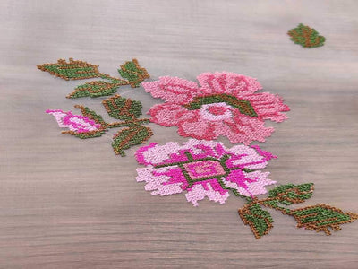 cream-organza-fabric-with-cross-stitched-embroidered-flowers-all-over