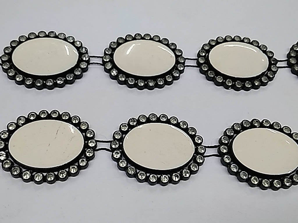 cream-oval-stone-studded-plastic-lace-with-enamel-fill-25x18-mm