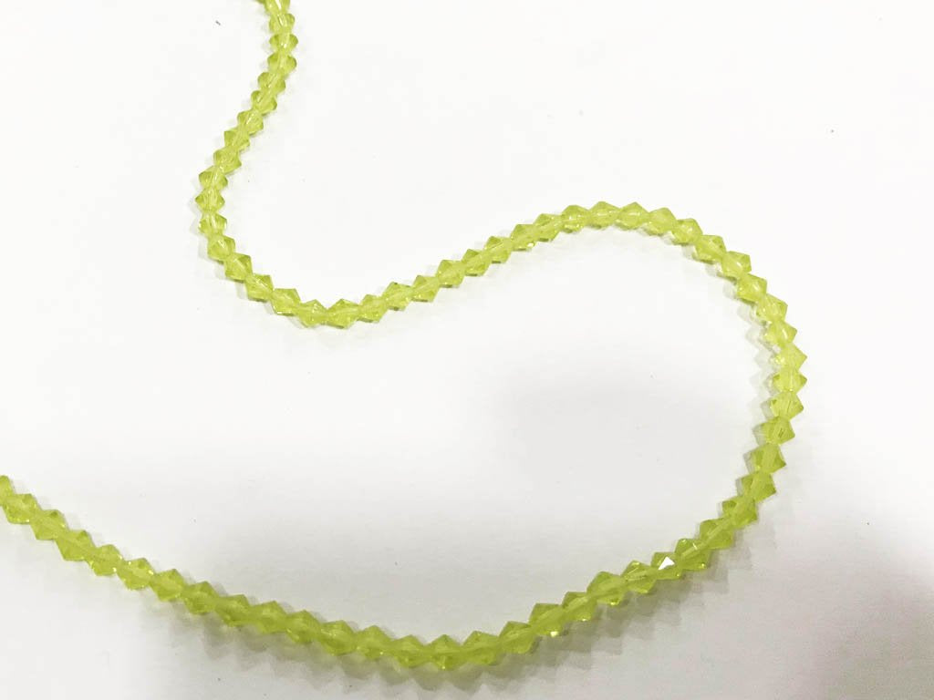 yellow-new-cut-cross-cut-pressed-glass-beads-4-mm