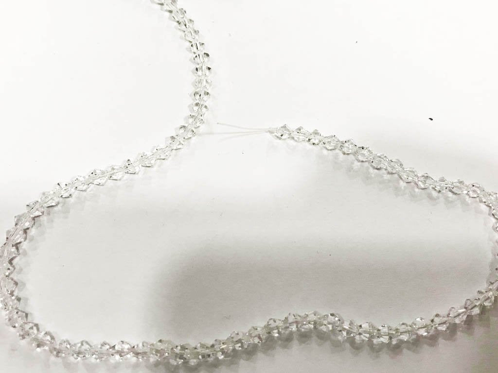 white-transparent-new-cut-cross-cut-pressed-glass-beads-4-mm