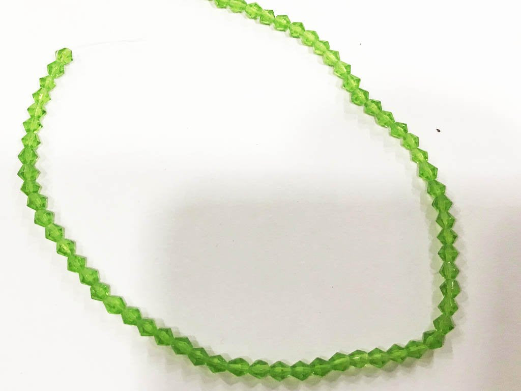 peridot-green-new-cut-cross-cut-pressed-glass-beads-4-mm