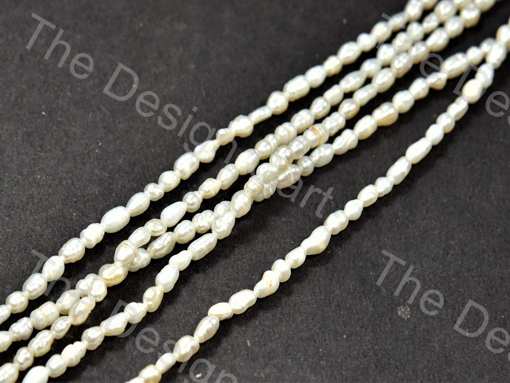Cream Pebble Shaped Mother Of Pearl Stones (578552856610)