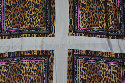 pre-cut-brown-abstract-leopard-printed-satin-fabric-with-black-border