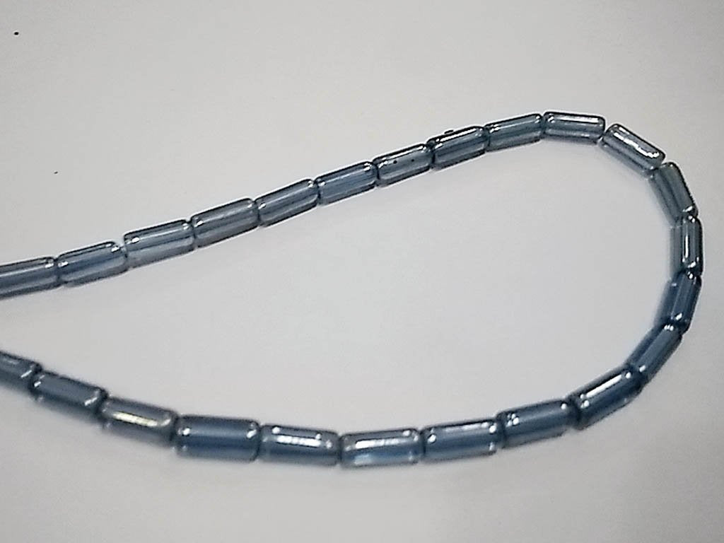 dark-blue-transparent-lustre-pipe-pressed-glass-beads-4x10-mm