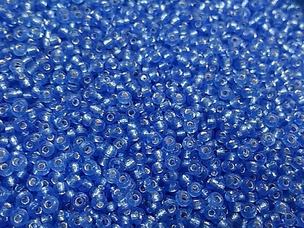 dark-blue-transparent-silverline-round-rocaille-glass-seed-beads
