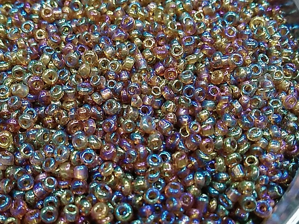 dark-golden-transparent-rainbow-round-rocaille-glass-seed-beads