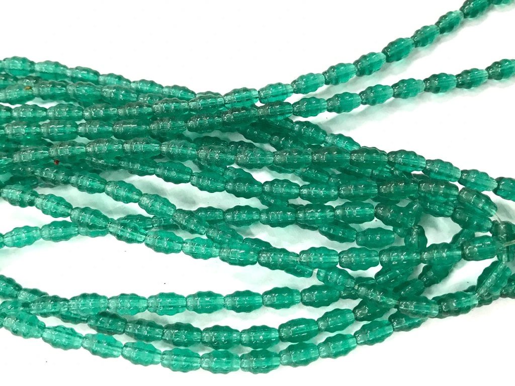 dark-green-fancy-oval-pressed-glass-beads
