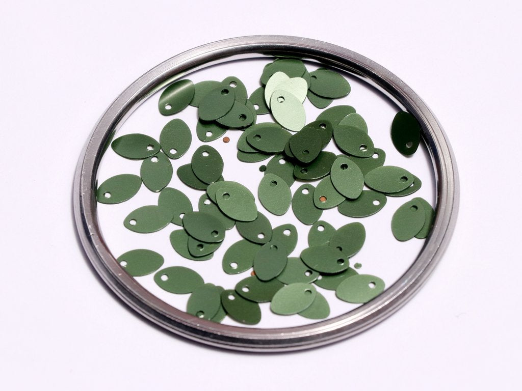dark-green-opaque-oval-plastic-sequins