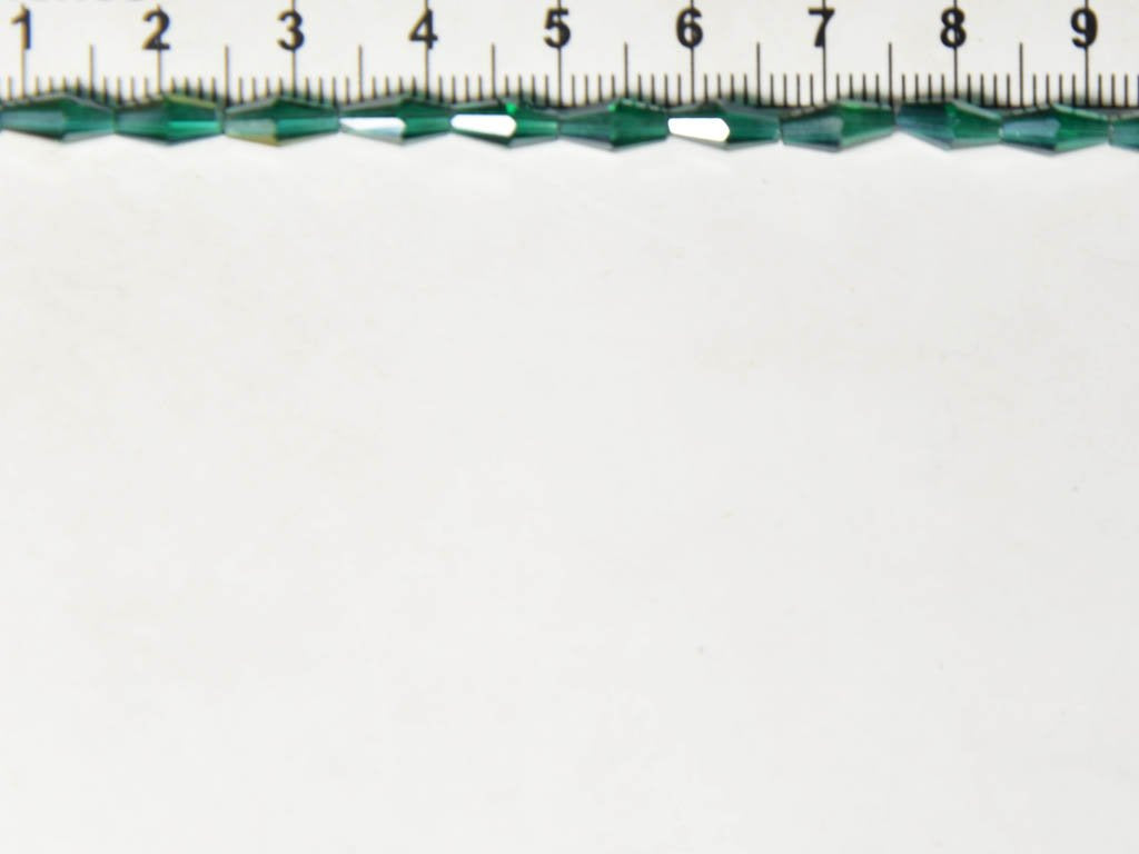 dark-green-rainbow-drum-crystal-beads