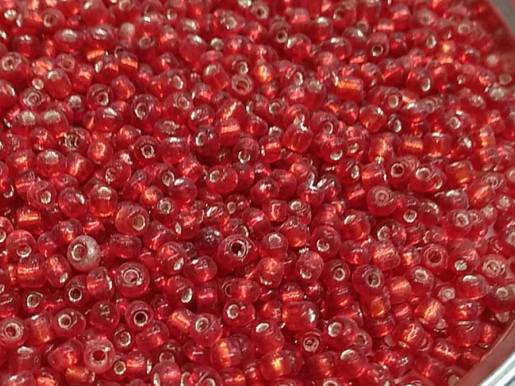 dark-orange-silverline-round-rocaille-glass-seed-beads