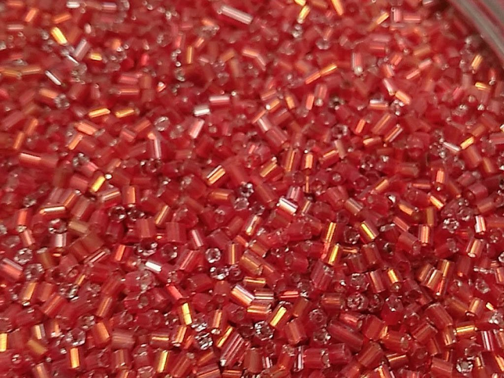 dark-orange-transparent-silverline-2-cut-glass-seed-beads