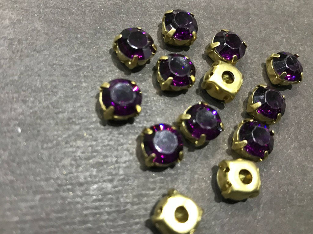 dark-purple-circular-resin-stones-with-catcher-8-mm