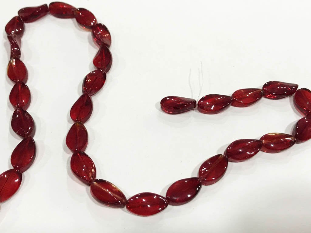 dark-red-twisted-oval-pressed-glass-beads-8x12-mm