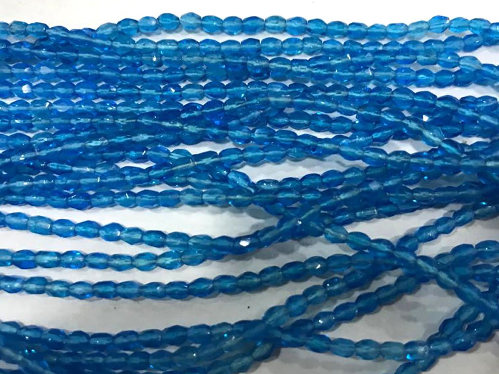 deep-blue-transparent-faceted-spherical-glass-seed-beads-3-mm