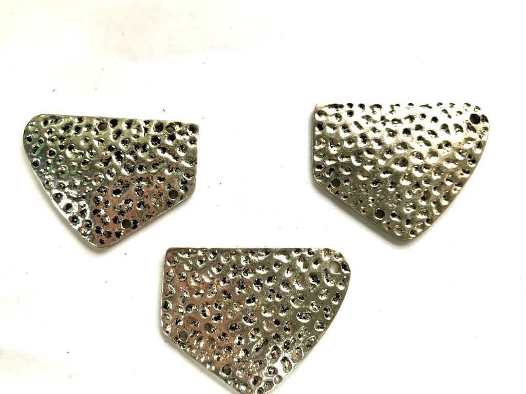 designer-silver-uneven-shaped-metal-piece
