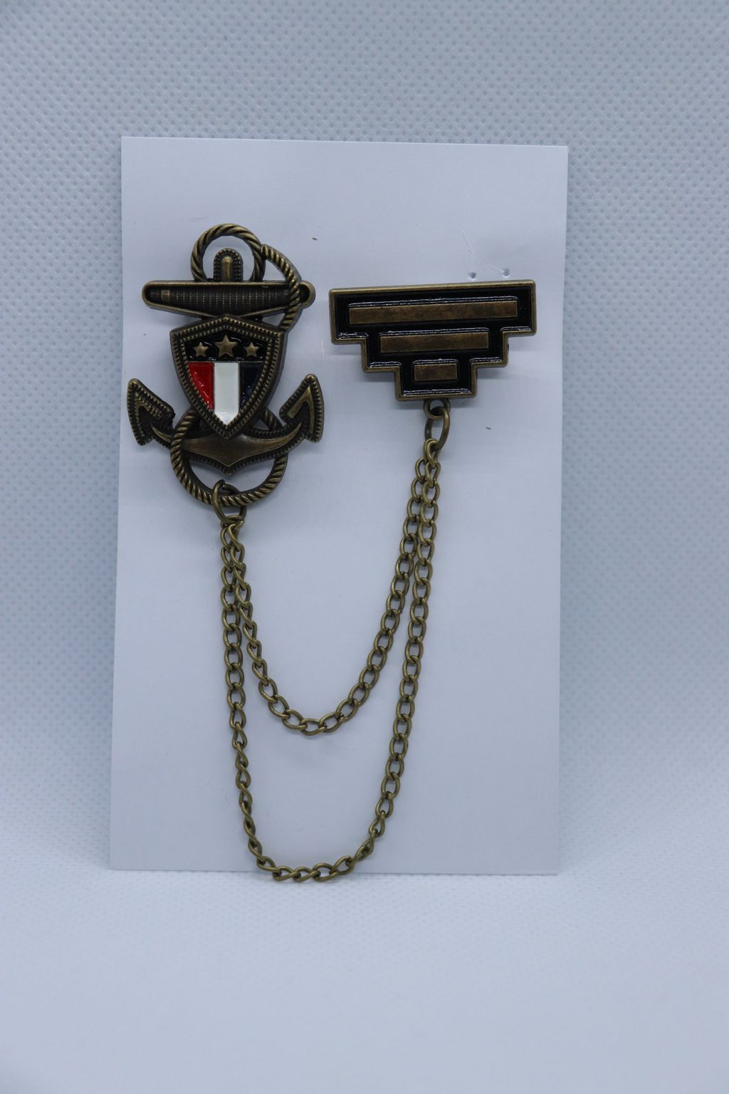 dull-gold-anchor-and-flag-brooch