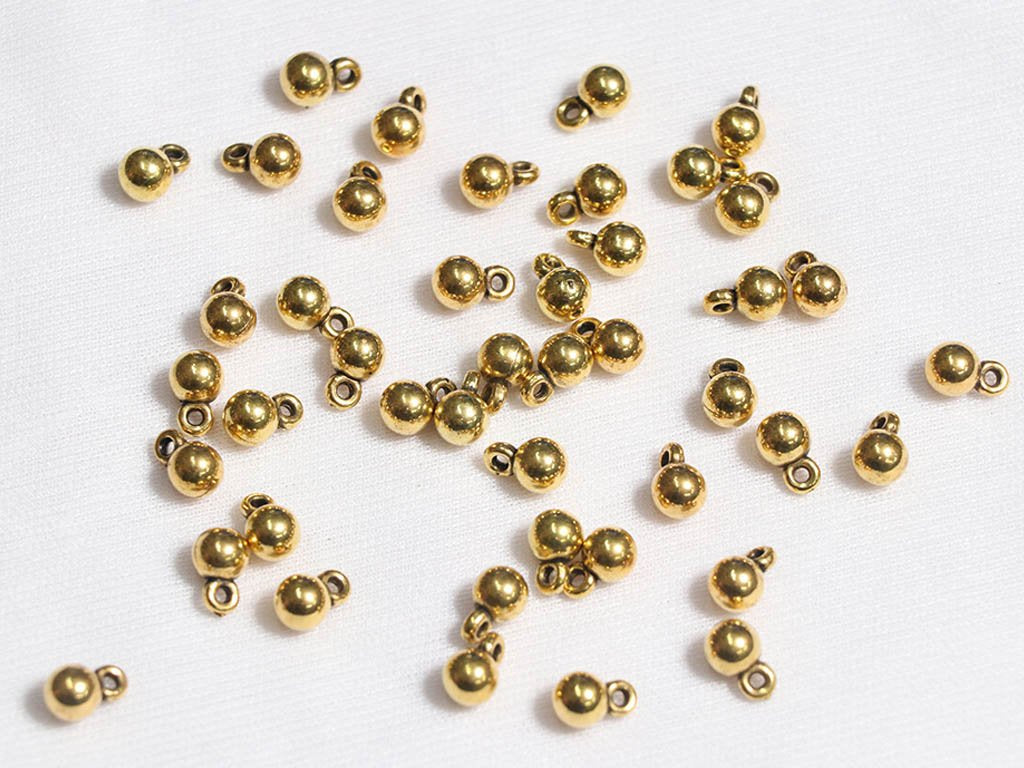 golden-bell-plastic-beads-5-mm