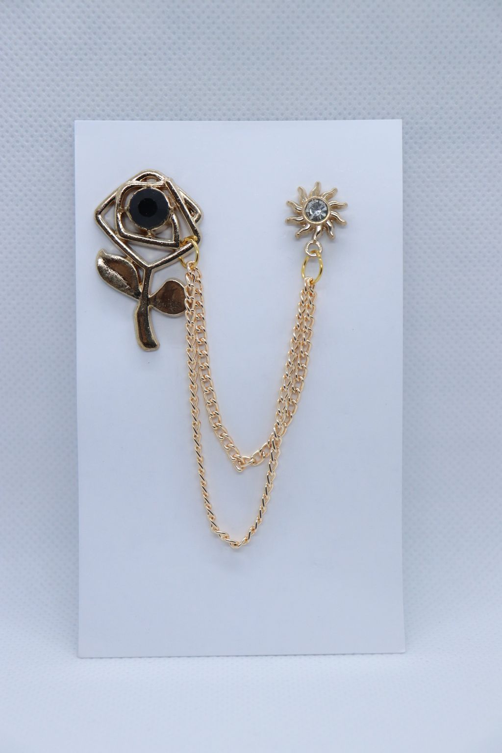 golden-big-flower-with-black-stone-metallic-brooch