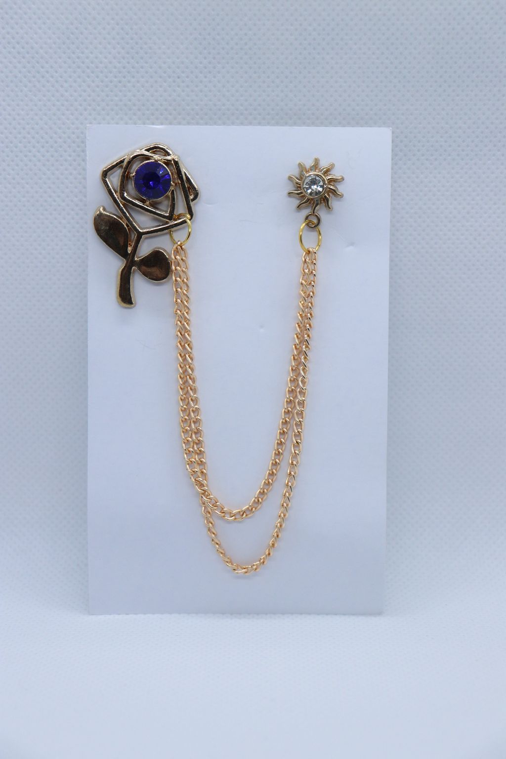 golden-big-flower-with-blue-stone-metallic-brooch