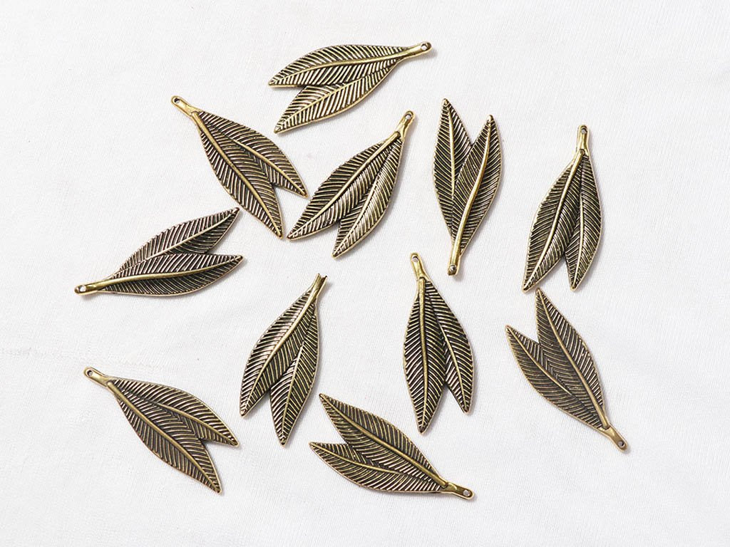 golden-double-leaves-designer-plastic-beads-52x20-mm