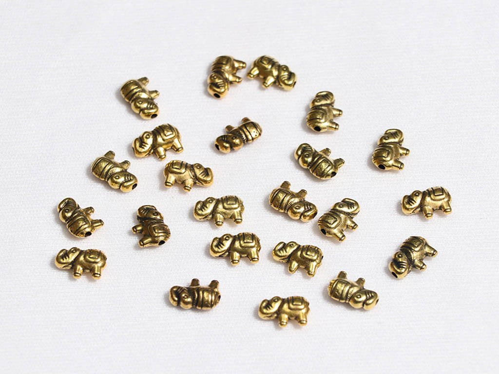 golden-elephants-plastic-beads-8x12-mm