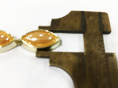 golden-eye-glass-stone-laces-with-plain-plastic-base